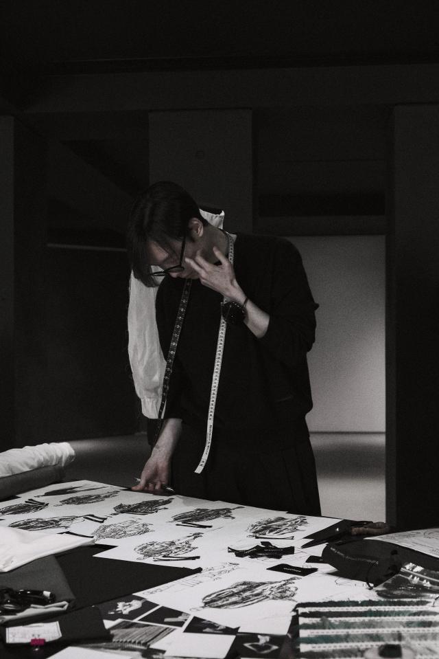 Jay Songzio works in his studio during the production process for the “ARIRANG” comeback performance Courtesy of Songzio