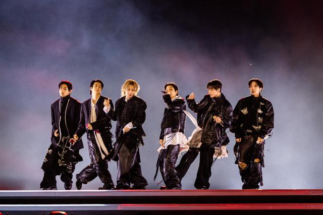 BTS perform in Songzio outfits during their comeback stage Courtesy of BRIGHT MUSIC AND NETFLIX