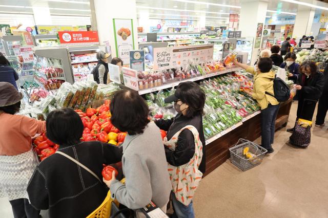 Shoppers gather at a discount section of a major supermarket in Seoul on Friday April 3 2026 as inflationary pressures mount AJP Han Jun-gu
