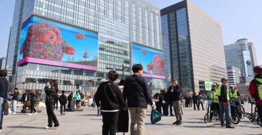 为节能关灯两小时 首尔缩短市中心大屏运营时间