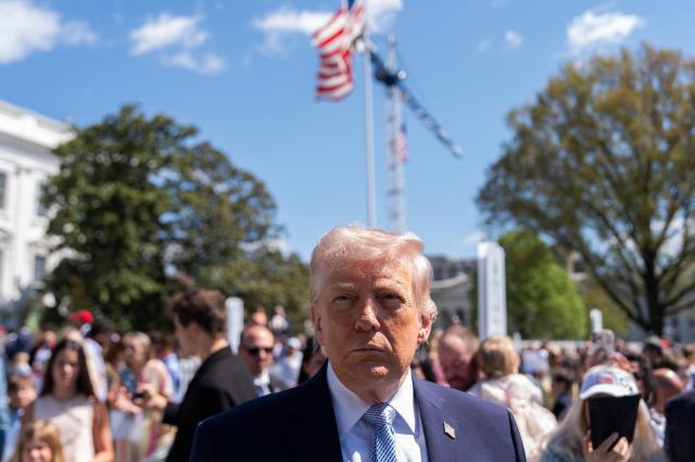 President Donald speaks with reporters during the White House Easter Egg Roll on the South Lawn of the White House Monday April 6 2026 in Washington APYonhap