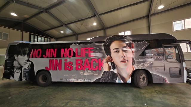 This photo captured from Social Media X @jin_fantree
show a sticker wrapped tour bus in order to celebrate BTS' Goyang Concert 