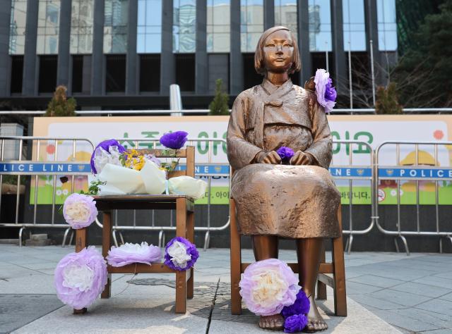 The Statue of Peace is seen outside police barricades in front of the former Japanese Embassy in Jongno-gu Seoul April 8 2026 AJP Han Jun-gu