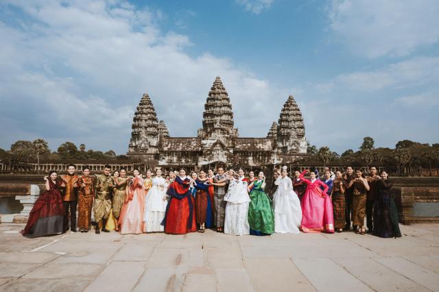 Models present hanbok during the first fashion show held at Angkor Wat a UNESCO World Heritage site Courtesy ﻿of the Korean Culture Association