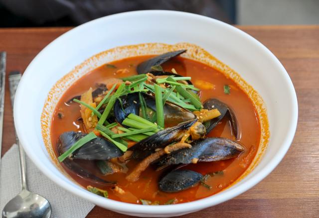 A signature dish “jjamppong sundubu” spicy seafood soft tofu stew is served at a restaurant in Chodang Sundubu Village in Gangneung Gangwon Province on April 8 2026 AJP Yoo Na-hyun 20260408
