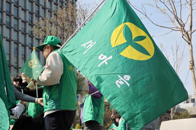 Members of the Saemaul Undong Central Council take part in a launch ceremony for a nationwide energy-saving campaign in response to soaring global oil prices at Gwanghwamun Square in central Seoul on April 13 2026 AJP Yoo Na-hyun

