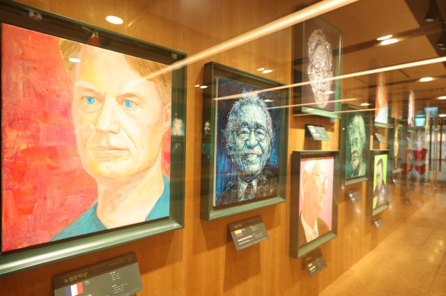 Portraits of Nobel Prize laureates are displayed in the Sejong-ro entrance corridor at Kyobo Book Centre in Gwanghwamun Seoul April 14 2026 AJP Han Jun-gu