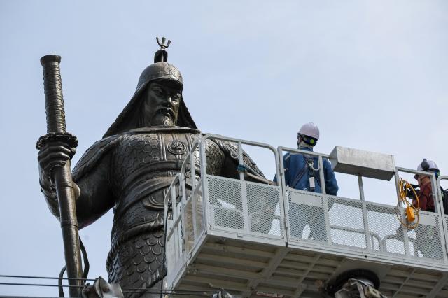 A statue of Yi Sun-sin is cleaned by Seoul Metropolitan Government officials at Gwanghwamun Square in central Seoul on April 14 2026 AJP Yoo Na-hyun
