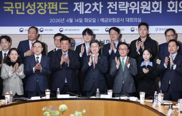 The Seoul government holds National Growth Fund meeting to select second round of investments on April 14 2026 FSC chair at the center co chairs Celltrion chairman in his right and Mirae Asset Management chairman at his left Yonhap
