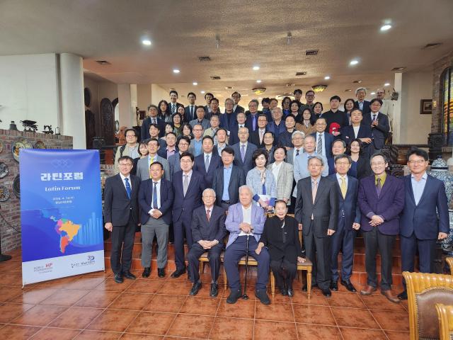 Guests speakers and VIPs pose for a group photograph during the Latin Forum held at the Latin American Cultural Center Museum in Goyang City on April 15 AJP Park Sae-jin