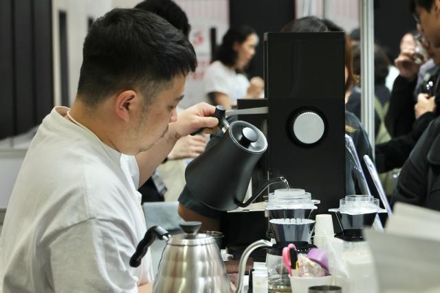 A barista brews coffee at the 2026 Seoul Coffee Expo held at COEX in southern Seoul on April 17 2026 AJP Han Jun-gu