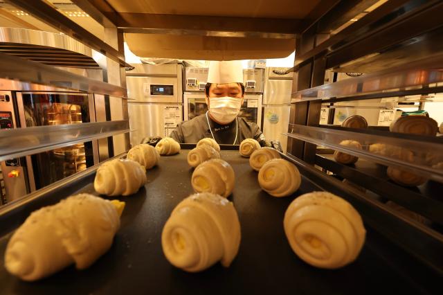 A baker makes bread at the 2026 Korea International Bakery Fair held at COEX in southern Seoul on April 17 2026 AJP Han Jun-gu