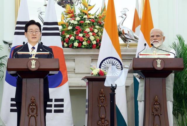 Lee, Indian PM Modi agree to upgrade CEPA, target $50 bln trade