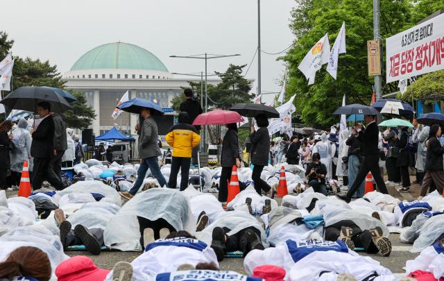 Parents of children with disabilities hold a rally in Seoul on April 20 2026 AJP Yoo Na-hyun


