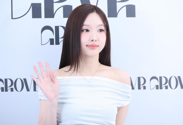 NAYEON a member of K-pop girl group TWICE poses for a photo at a promotional event for fashion brand GROVE in Gangnam-gu on April 21 2026 AJP Yoo Na-hyun



