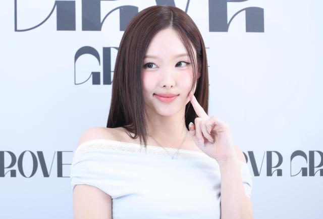 
NAYEON a member of K-pop girl group TWICE poses for a photo at a promotional event for fashion brand GROVE in Gangnam-gu on April 21 2026 AJP Yoo Na-hyun


