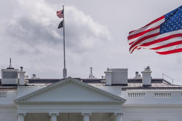 The American flag flies above the White House Sunday April 19 2026 in Washington AP-Yonhap 