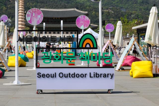 Officials prepare for the opening of the “Gwanghwamun Book Yard” outdoor library at Gwanghwamun Square in Seoul on April 23 2026 marking World Book and Copyright Day AJP Yoo Na-hyun