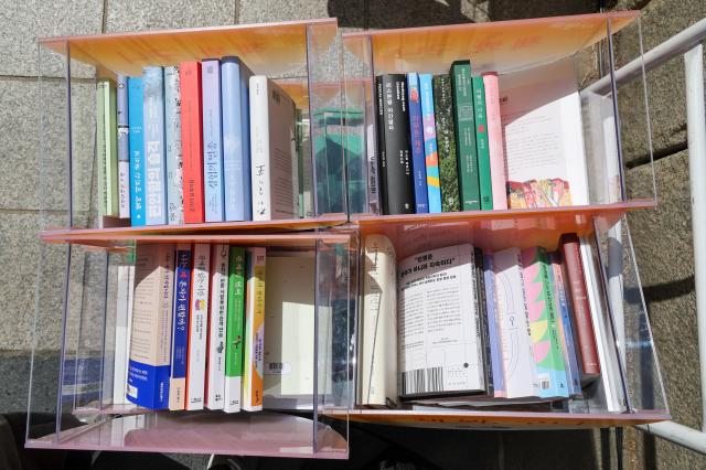 The “Reading Clear Stream” outdoor library event takes place along Cheonggyecheon Stream in central Seoul on April 23 2026 as Seoul launched its outdoor library program on World Book and Copyright Day AJP Yoo Na-hyun 20260423