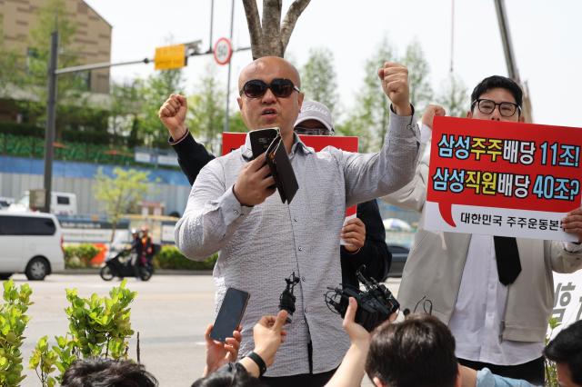 Representatives of the Korea Shareholder Movement Headquarters opposing the union rally shout slogans near Samsung Electronics Pyeongtaek Campus in Pyeongtaek Gyeonggi Province where the Samsung Electronics Labor Union Joint Struggle Headquarters is holding a struggle resolution rally April 23 2026 AJP Han Jun-gu