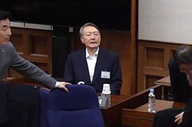 Prosecutors seek 30-year prison term for ex-president over drone-related allegation