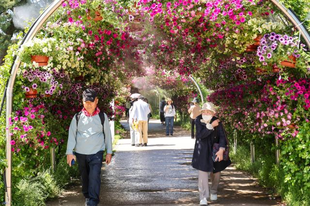Visitors look around the Goyang International Flower Festival at Ilsan Lake Park in Goyang Gyeonggi Province on April 24 2026 AJP Yoo Na-hyun




