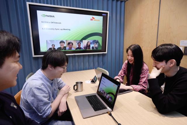 SK Telecom said on April 22 2026 that it unveiled the outcomes of its technological collaboration with NVIDIA in AI model development during a technical panel session at NVIDIA Nemotron Developer Days Seoul 2026 on April 21 AI model developers at SK Telecom’s Euljiro headquarters are holding a remote meeting with NVIDIA representatives Yonhap