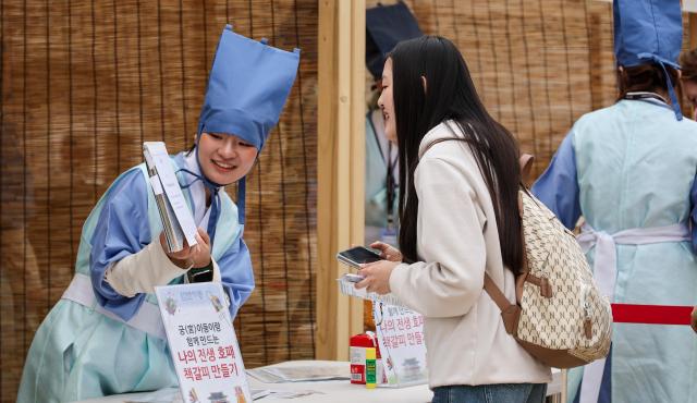 Visitors attend the 2026 Spring Royal Culture Festival at Gyeongbokgung Palace in Seoul on April 27 2026 AJP Yoo Na-hyun

