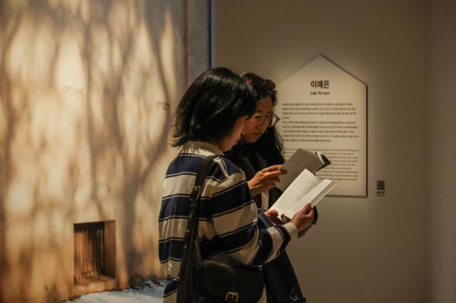 Visitors attend the Seoul Photo Festival themed “Come Back Home” at the Seoul Museum of Photography in Dobong District Seoul on April 282026 AJP Yoo Na-hyun

