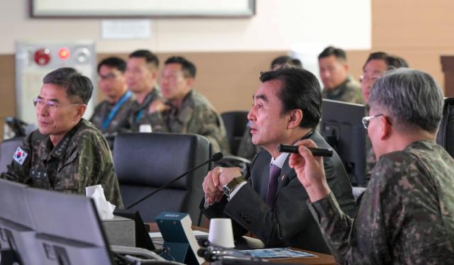 Defense Minister Ahn Gyu-back inspects military readiness at the Navy Operations Command’s command and control center April 16 2026 Yonhap 