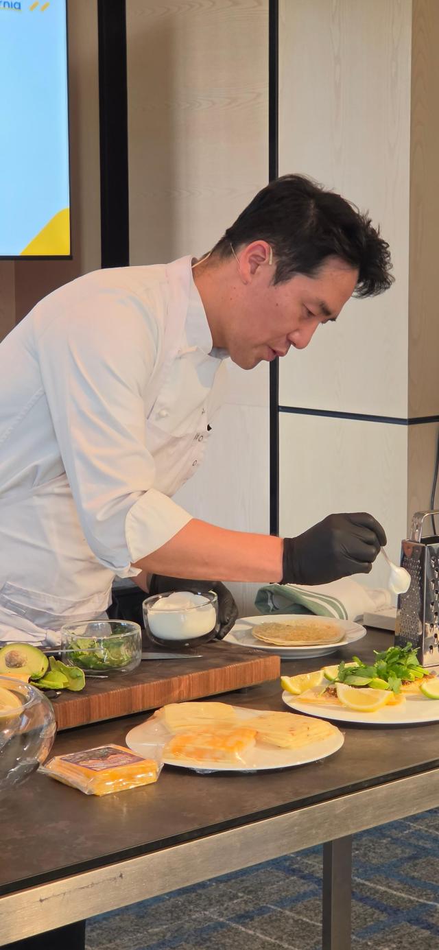 Chef Sam Kim demonstrates beef tacos using California cheese at the Seoul event on April 30.