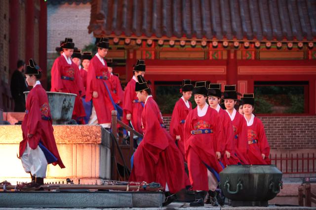 Performers enter the 2026 Royal Palace Concert at Changdeokgung Palace Injeongjeon Hall in Seoul on May 1 2026 AJP Yoo Na-hyun