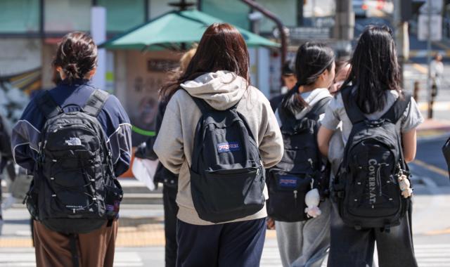 Students carrying backpacks head to private academies in the Daechi-dong district of Seoul on Monday May 4 2026 AJP Yoo Na-hyun