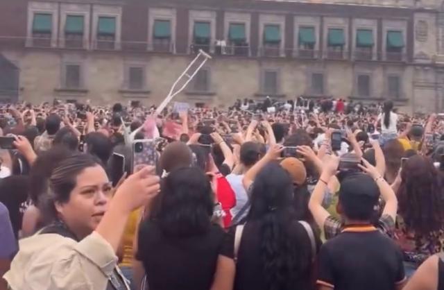 This photo captured from social media x (@SrQuakity)  show tens of thousands of fans gathered in front of the presidential office 