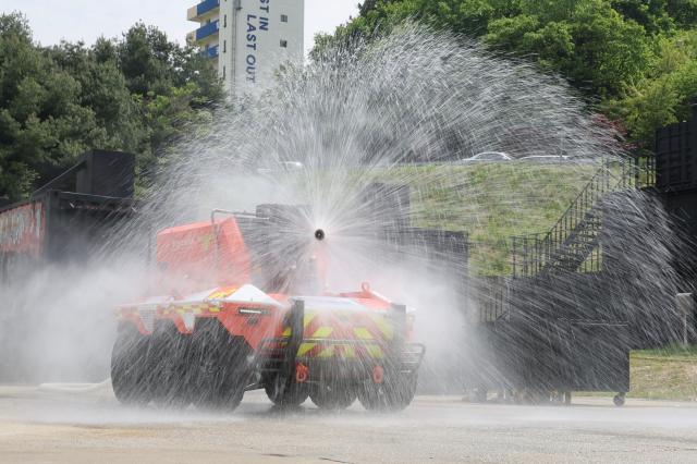 Gyeonggi fire services demonstrates unmanned firefighting robot FIRO