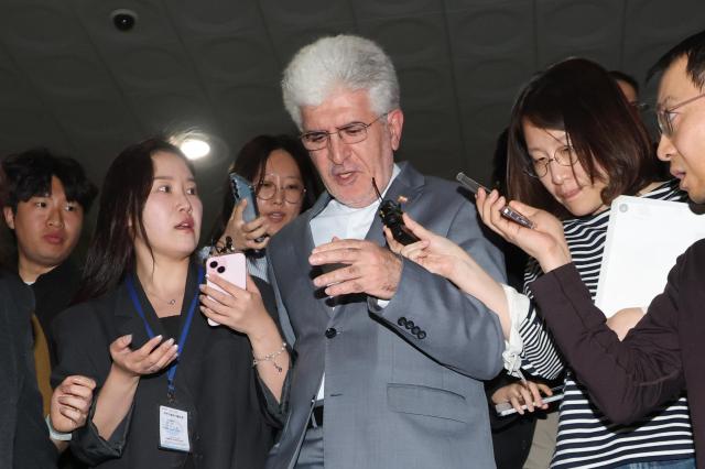 Iranian Ambassador to South Korea Saeed Kouzechi leaves the foreign ministry at the Government Complex Seoul on May 10 2026 after being summoned over the attack on the HMM Namu in the Strait of Hormuz Yonhap 
