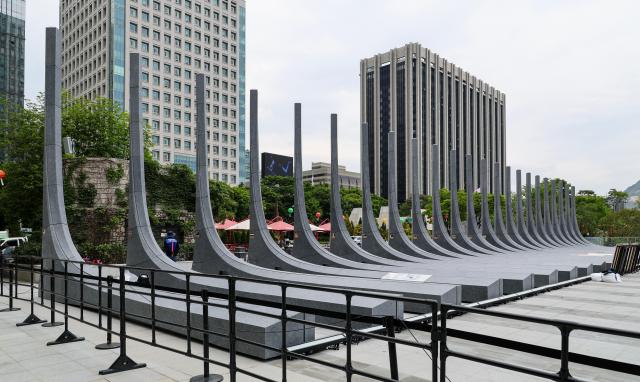 The “Garden of Gratitude” and a rifle salute sculpture honoring allied nations that participated in the 1950-53 Korean War are seen at Gwanghwamun Square in Seoul on May 11 2026 The opening ceremony for the memorial garden is scheduled for May 12 AJP Yoo Na-hyun