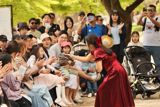 Visitors watch a musical performance by Mulove at the Nami Island International Childrens Book Festival held on Nami Island in Chuncheon Gangwon Province May 10 2026 AJP Han Jun-gu