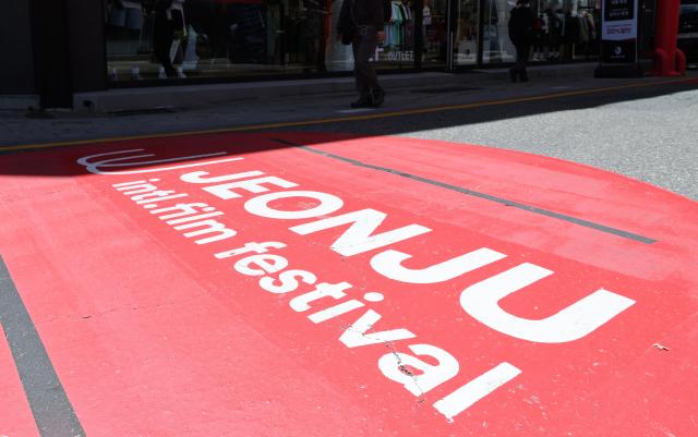 Visitors walk along Jeonju Film Street in Jeonju North Jeolla Province on May 8 2026 AJP Yoo Na-hyun