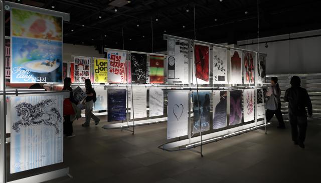 Visitors view the “100 Films 100 Posters” exhibition at Munhwa Gongpanjang Jakdang in Jeonju North Jeolla Province on May 8 2026 AJP Yoo Na-hyun