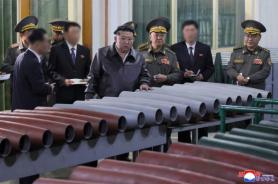 North Korean leader inspects munitions factories, calls for stronger artillery forces