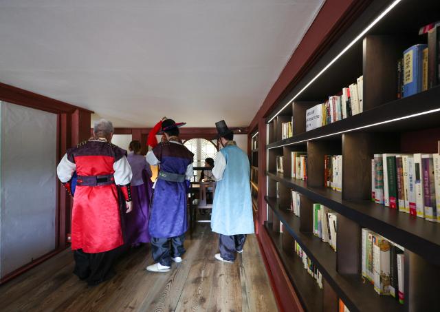 Visitors look around Jibokjae known as King Gojong’s royal library at Gyeongbokgung Palace in central Seoul on May 13 2026 AJP Yoo Na-hyun

