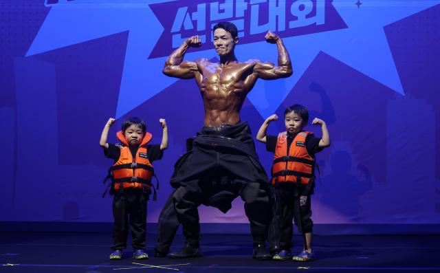 Firefighters compete during the 15th Seoul Bodybuilder Firefighter Contest at the Seoul Fire Academy in Seoul on May 14 2026 AJP Yoo Na-hyun

