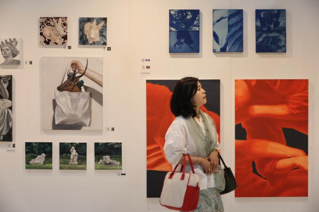 A visitor views artworks at the Seoul Art Fair held at SETEC in Daechi-dong Gangnam-gu Seoul May 15 2026 AJP Han Jun-gu