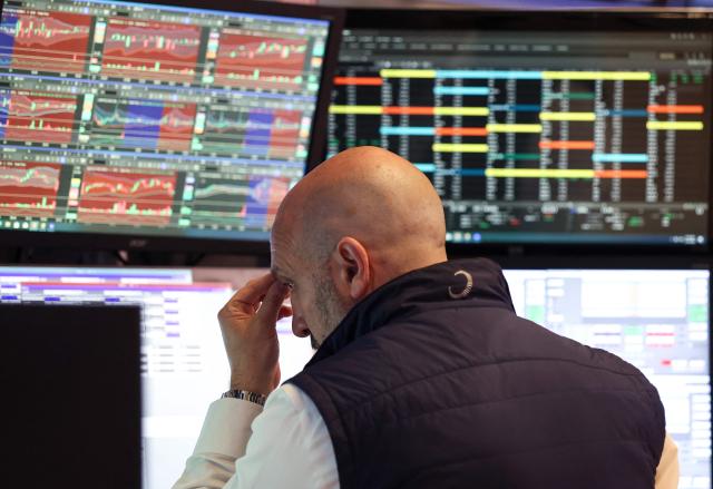 A trader works on the floor of the New York Stock Exchange NYSE at the opening bell in New York on May 14 2026 AFPYonhap