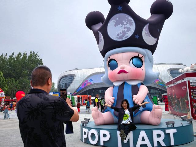 A giant Molly figure at the festival