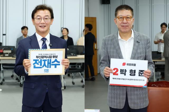 Jeon Jae-soo, the Democratic Party candidate for Busan Mayor, and Park Hyung-jun, the People Power Party candidate, registered as candidates for the June 3 local elections at the Busan Election Commission on May 14. Photo: Yonhap News