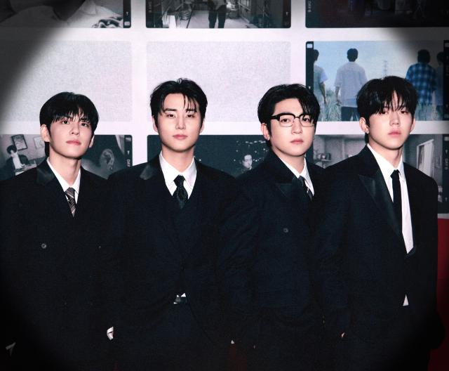 This file image provided by JYP Entertainment shows a poster for K-pop band DAY6’s upcoming “10th Anniversary Tour The DECADE FINALE” concerts