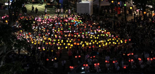 Glowing lanterns greet Buddhas Birthday