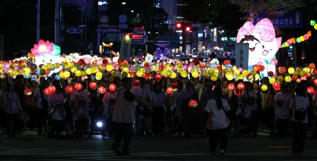 Participants take part in the Yeondeunghoe lantern parade near Bosingak in Seoul’s Jongno District on May 16 2026 ahead of Buddhas Birthday AJP Yoo Na-hyun

